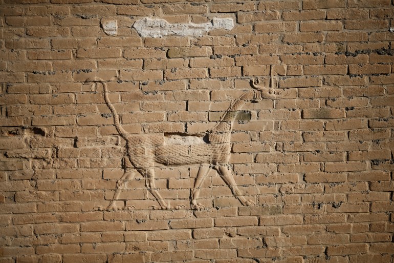 A view of a dragon on the wall of the ancient city of Babylon near Hilla