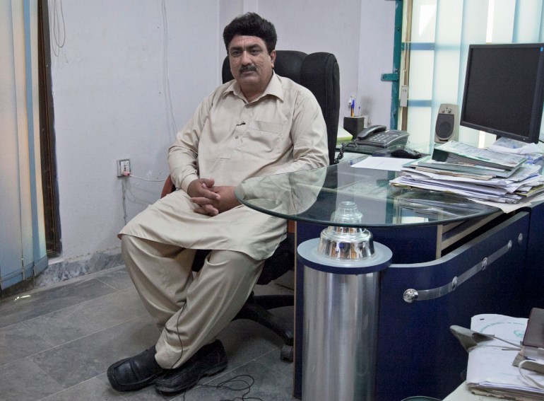 Jamil Afridi, brother of Pakistani doctor Shakil Afridi, gestures during an interview with Reuters in Peshawar
